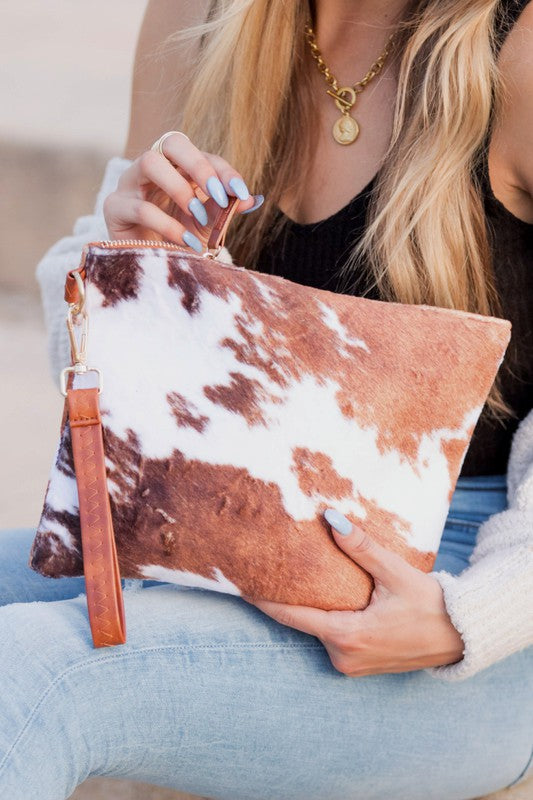 FAUX FUR COW ANIMAL PRINT CLUTCH