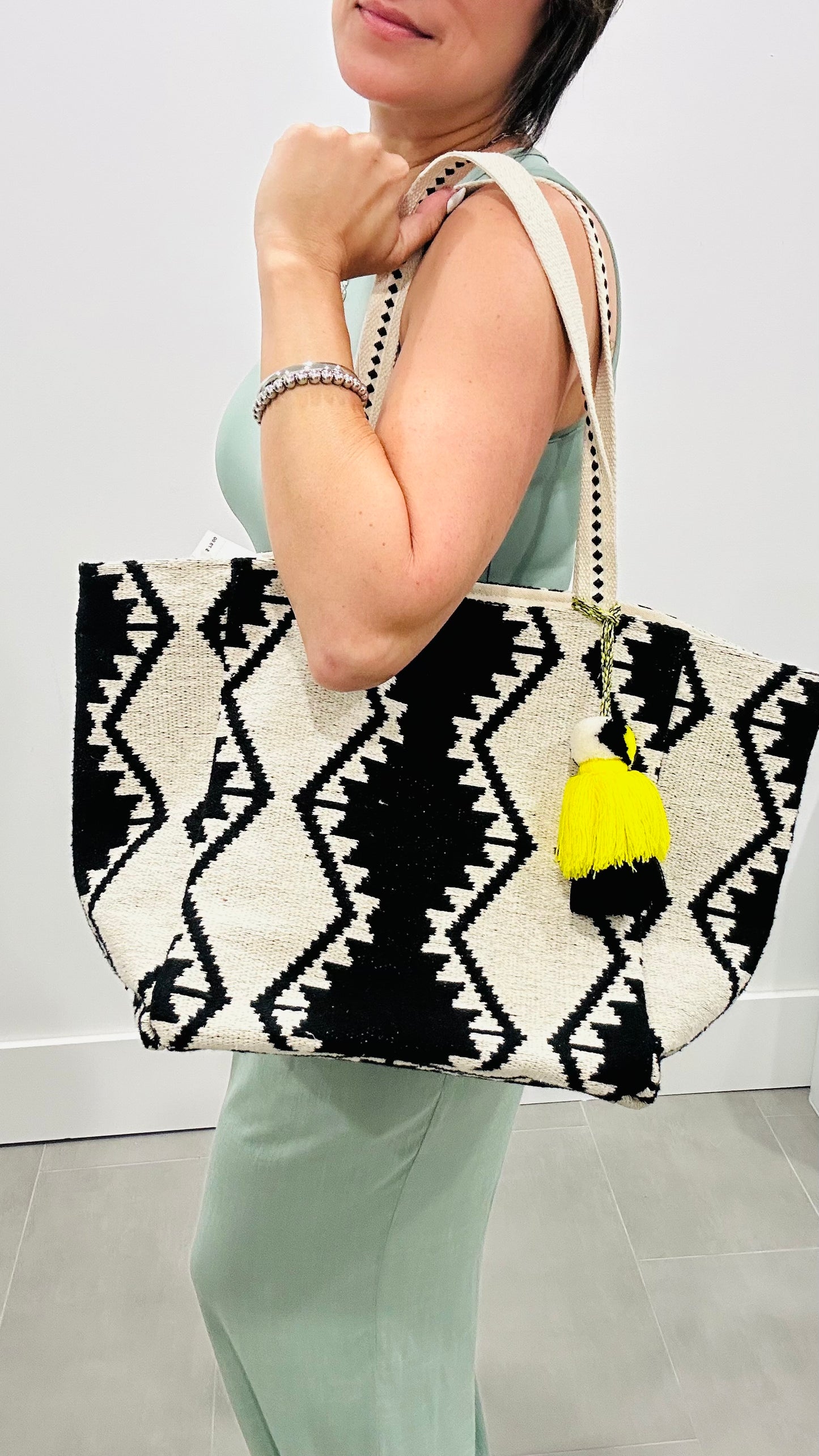 A&B BLACK AZTEC BAG W/ YELLOW POM POM