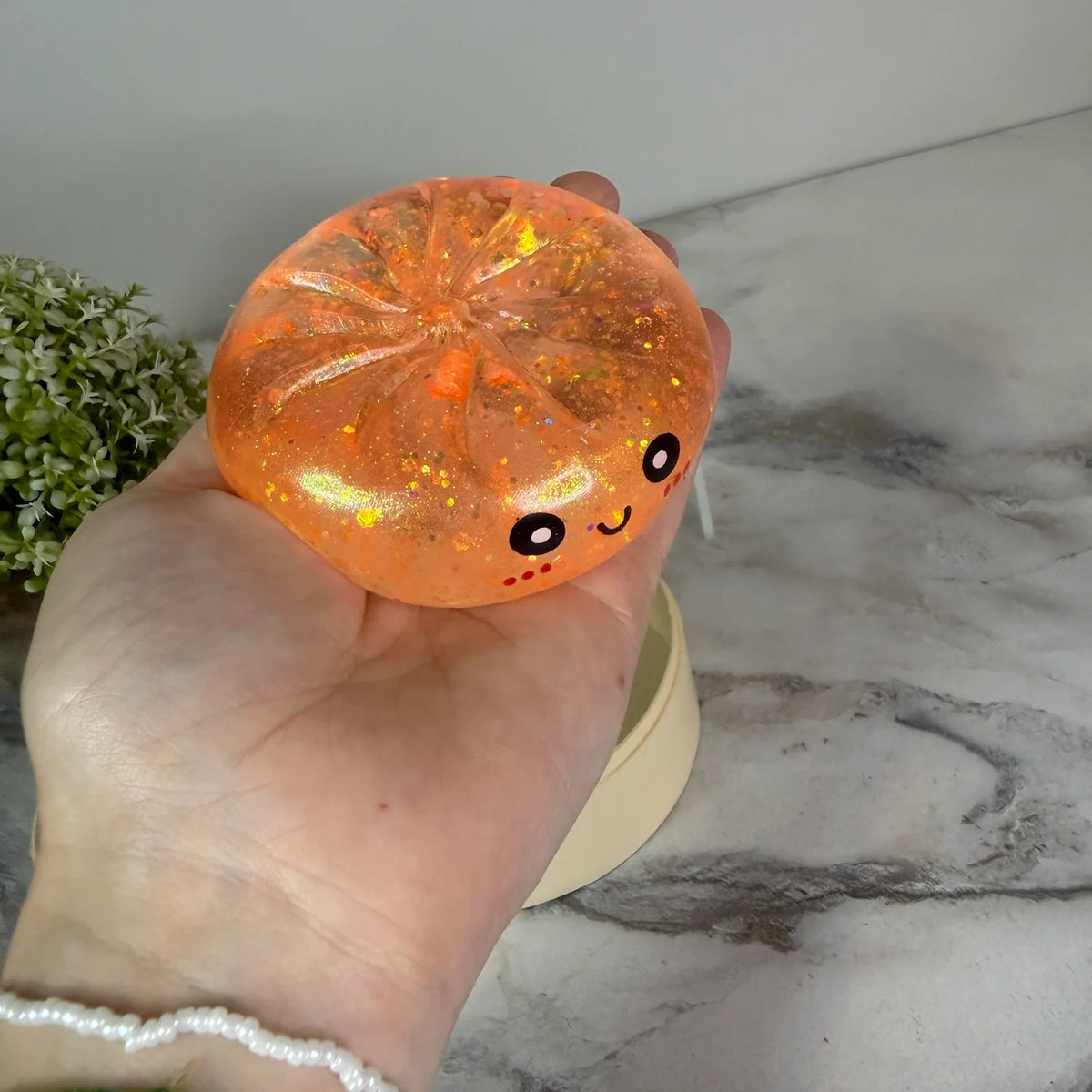 Squishy Toy - Viral Dumpling Orange Glitter